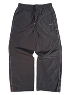 Pantalon de sport pour femme avec bande latérale violette