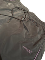Pantalon de sport pour femme avec bande latérale violette