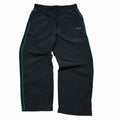Pantalones de chándal verdes con raya lateral