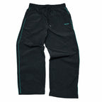 Pantalones de chándal verdes con raya lateral